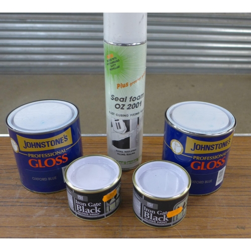 2253 - Three assorted lengths of nylon rope, four assorted plastic clothes lines, two 180ml tins of iron ga... 