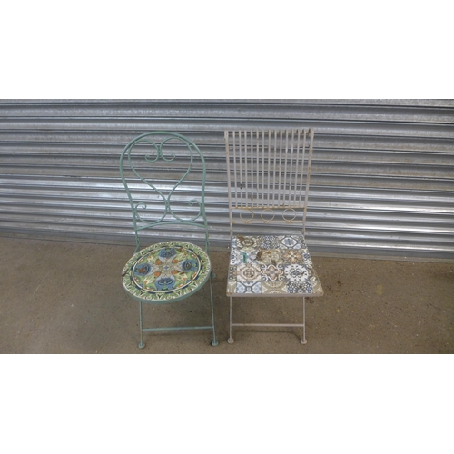 2284 - Two folding metal garden chairs and a cast metal sun dial