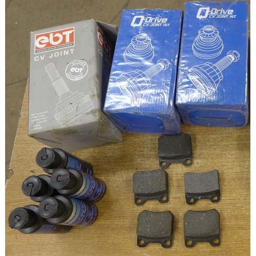 2301 - A large quantity of assorted car parts; VD joints, lubricants, lights, electronics, footwell mats, g... 