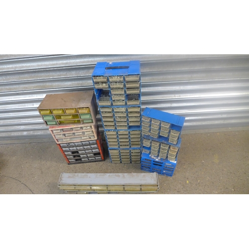 2303 - A large amount of trays buckets and workshop organisers of screws, nuts, bolts, hollow wall fixing b... 