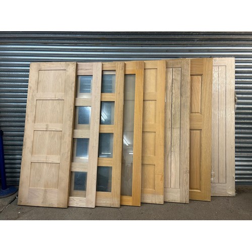2223 - 8 oak doors - various sizes and styles including doors with glass panels
