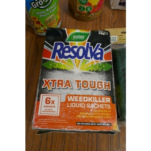 2364 - A box if various garden items including: Resolva weed killer, Gro-Sure slow release plant food, ect.