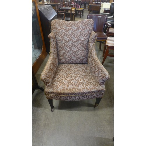 173 - A Edward VII beech and fabric upholstered armchair