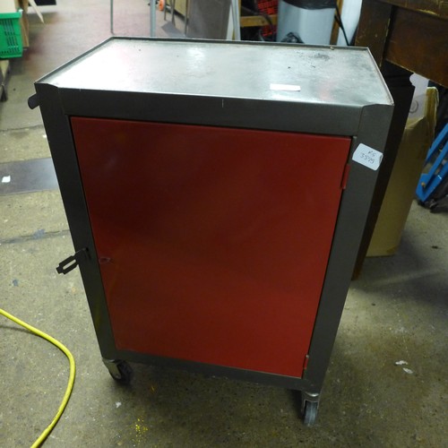 2024 - A black and red metal tool cabinet on castors