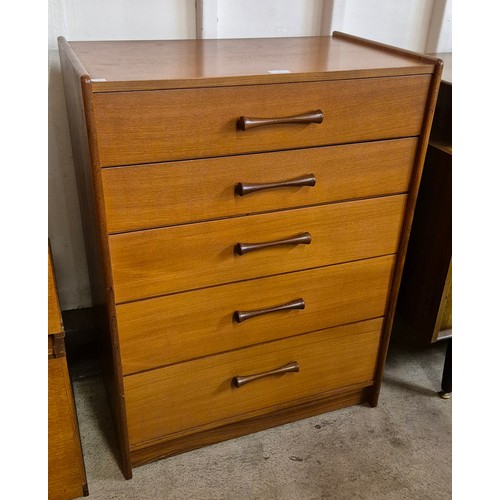 7 - A teak chest of drawers