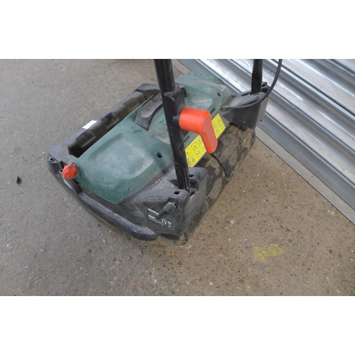 2250 - A Qualcast electric rear roller cylinder mower (SCM32A) and a Bosmere lawn raker