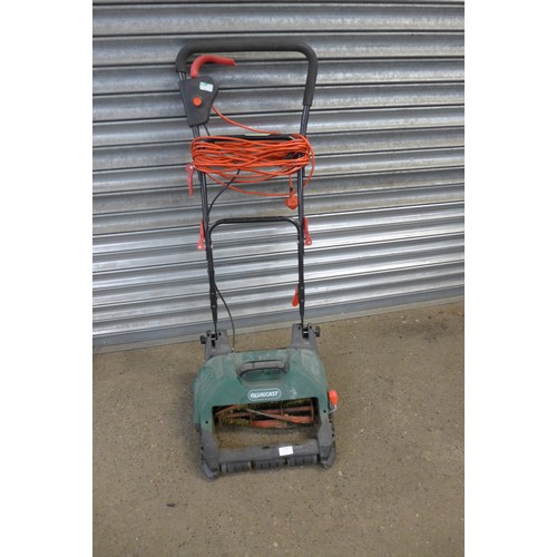 2250 - A Qualcast electric rear roller cylinder mower (SCM32A) and a Bosmere lawn raker