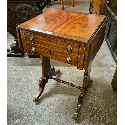 111 - A George IV inlaid mahogany fitted writing table
