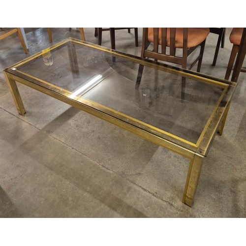 77 - An Italian brass and glass topped rectangular coffee table