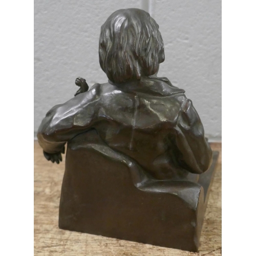 367 - After Leon Tharel (Swiss), bronze figure of a recumbent violinist, 19.5cms