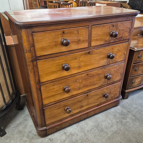 164 - A Victorian walnut chest of drawers