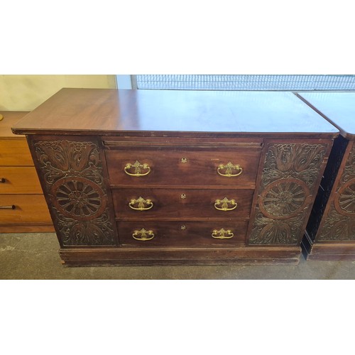 171 - A pair of Victorian Aesthetic Movement carved walnut estate cupboards