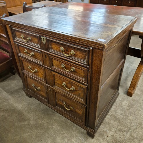 209 - A William III oak geometric moulded chest of drawers