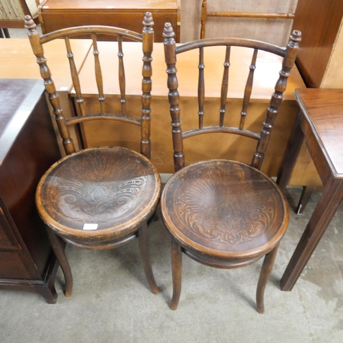 154 - A pair of early 20th Century beech bentwood chairs