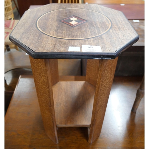 165 - A small Arts and Crafts oak octagonal occasional table