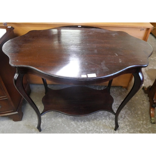170 - An Edward VII mahogany serpentine centre table