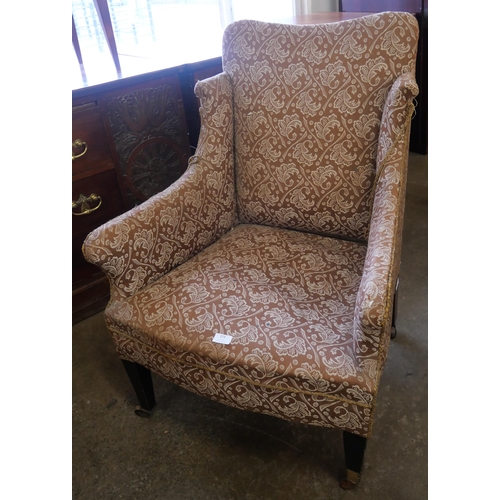 173 - A Edward VII beech and fabric upholstered armchair