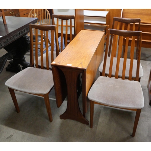 18 - A G-Plan Fresco teak drop-leaf table and four chairs