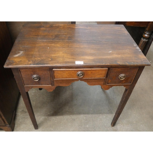 201 - A George III oak lowboy