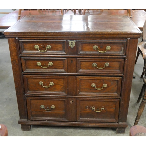 209 - A William III oak geometric moulded chest of drawers