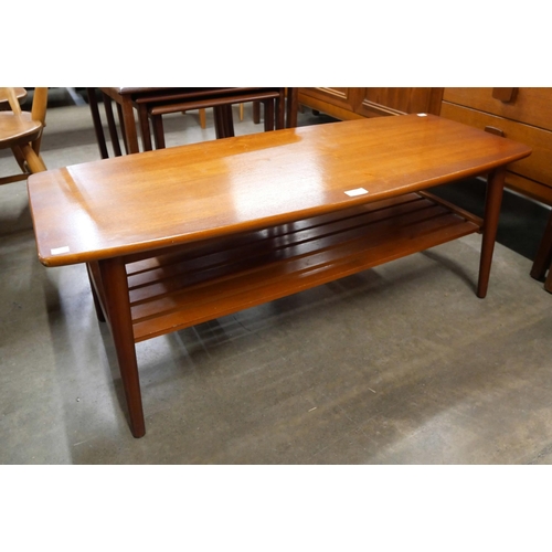 22 - A teak rectangular coffee table