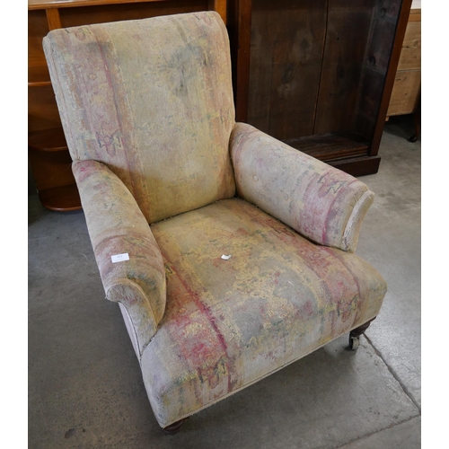 221 - A late Victorian fabric upholstered armchair