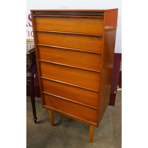 27 - An Austin Suite teak chest of drawers