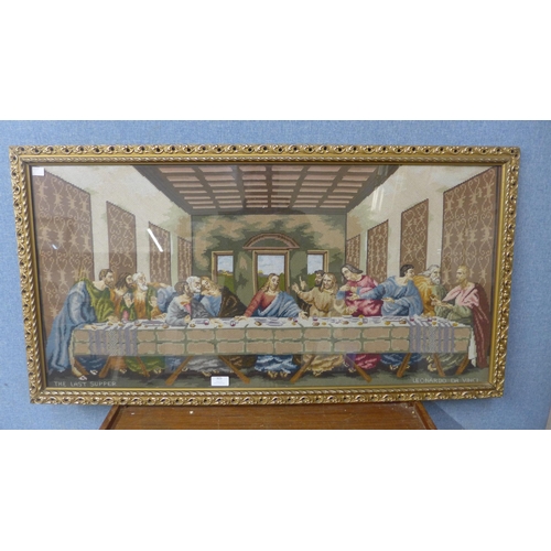 323 - A framed tapestry, The Last Supper, framed