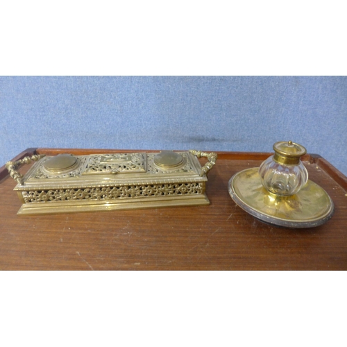 336 - Two Victorian brass inkwells/deskstands