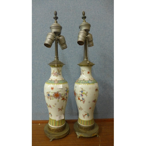 337 - A pair of famille rose porcelain and gilt metal table lamps