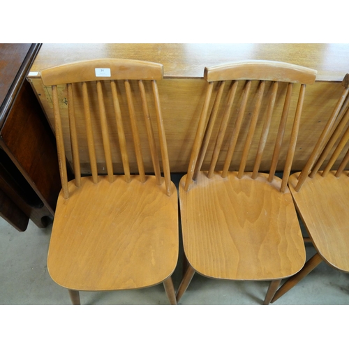 34 - A set of four beech kitchen chairs