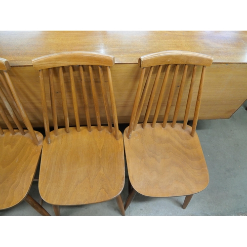 34 - A set of four beech kitchen chairs