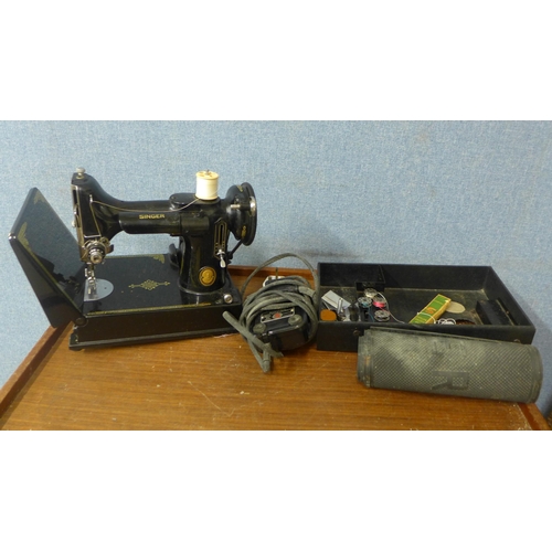 343 - A cased Singer sewing machine