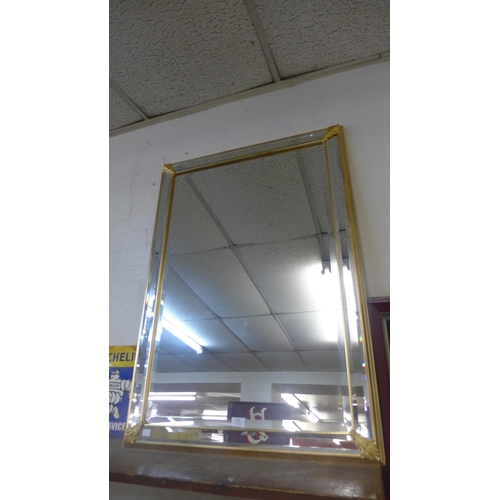 352 - A gilt framed mirror