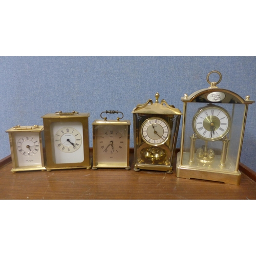 356 - Five brass timepieces