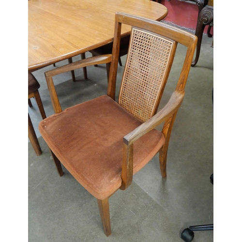 36 - A G-Plan Sierra teak extending dining table and four Fresco dining chairs