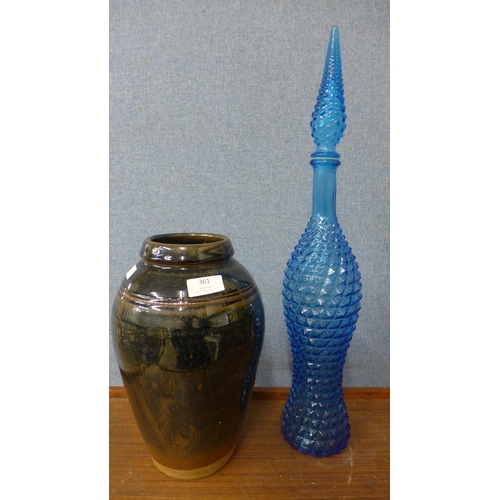 361 - A black studio pottery vase and a blue glass vase