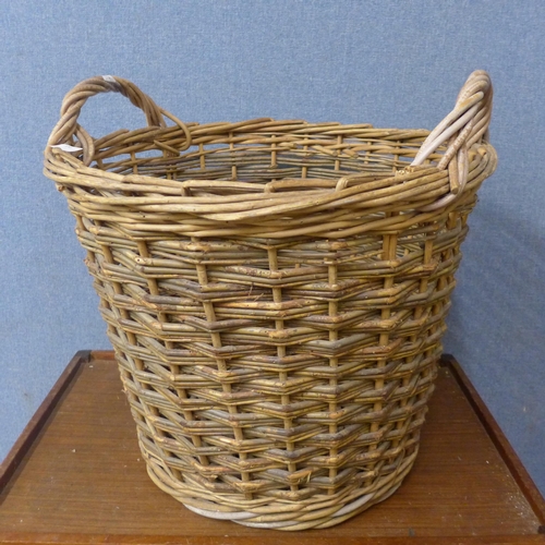 370 - A wicker laundry basket