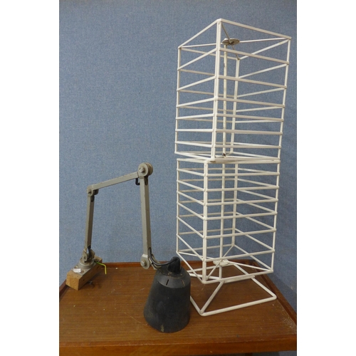 375 - An industrial anglepoise lamp and shop display stand