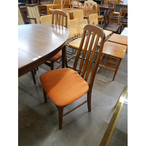 42 - A Sutcliffe of Todmorden S-Form tola wood table and chairs
