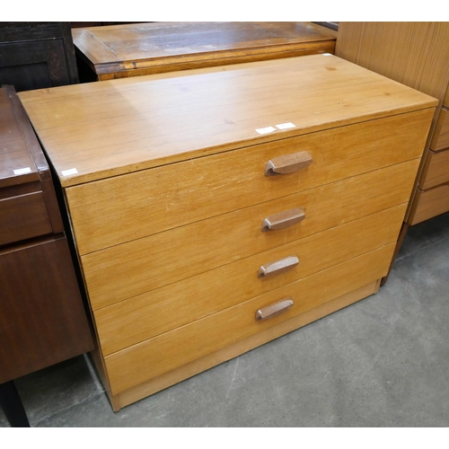 74 - A teak chest of drawers