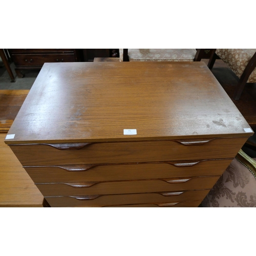 75 - A Europa teak chest of drawers