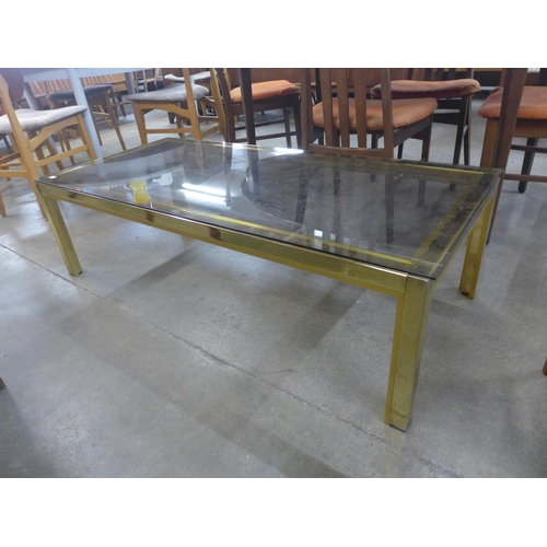 77 - An Italian brass and glass topped rectangular coffee table