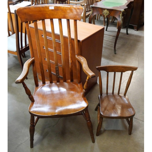 95 - A Victorian elm and beech kitchen chair and a similar child's chair