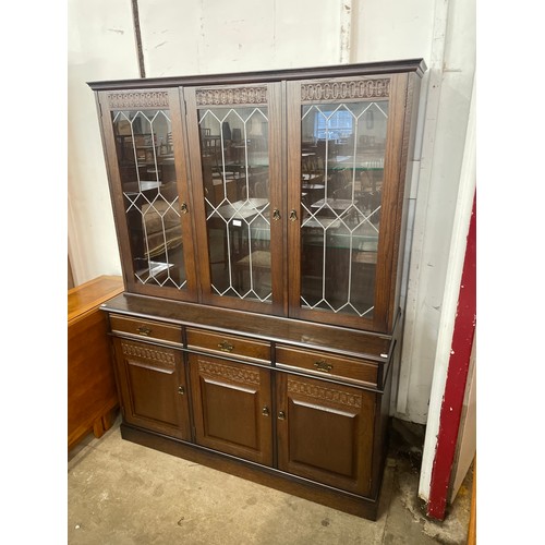 143 - An oak display cabinet
