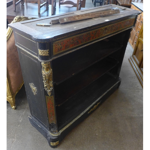 135 - A 19th Century French ebonised, Boulle work anb ormolu mounted open bookcase