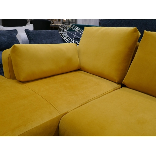1301 - A turmeric velvet L shaped sofa