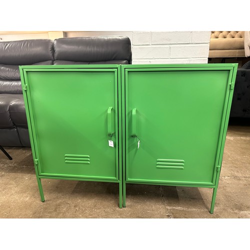 1304 - A pair of green industrial style cabinets