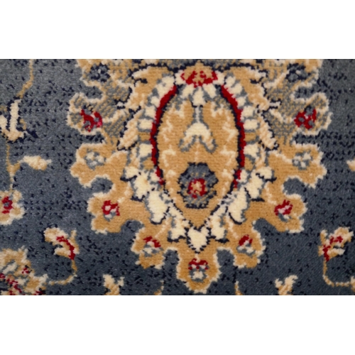 1318 - A duck egg blue ground Cashmere all over floral design rug, 170 x 120cm