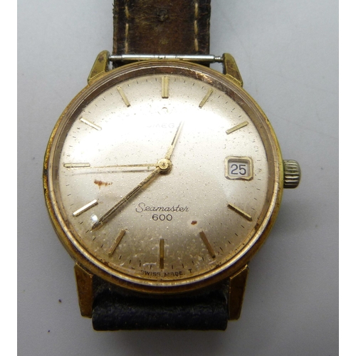 1018 - An Omega Seamaster 600 wristwatch, a lady's Omega wristwatch in a 9ct gold Dennison case, lacking gl... 